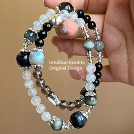 Aquamarine, Ice Quartz, Hawk Eye, Blue Tiger's Eye, and Black Hair Crystal Designed Bracelet