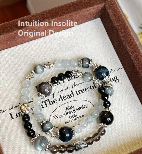 Aquamarine, Ice Quartz, Hawk Eye, Blue Tiger's Eye, and Black Hair Crystal Designed Bracelet