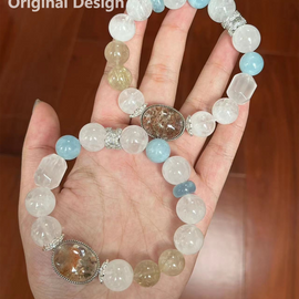 White Phantom Quartz, Aquamarine, Golden Hair Quartz, and Randomly Colored Ghost Agate Crystal Designed Bracelet