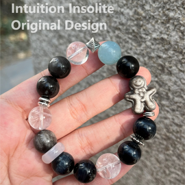 White Phantom Quartz, Aquamarine, Silver Sheen Obsidian, and Gingerbread Man Charm Designed Bracelet
