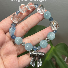 Aquamarine, Black Gold Super, White Crystal, and Bowknot Crystal Designed Bracelet